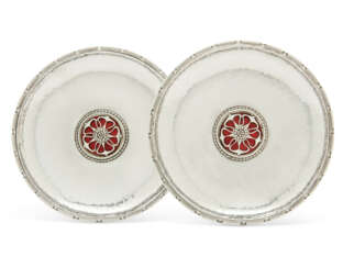 A PAIR OF GEORGE V ARTS AND CRAFTS STYLE SILVER AND ENAMEL DISHES