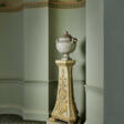 A GEORGE III WHITE-PAINTED AND PARCEL-GILT PEDESTAL - Auktionsarchiv