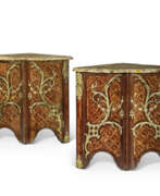 Charles Cressent. A PAIR OF REGENCE ORMOLU-MOUNTED AMARANTH, AND SATINWOOD PARQUETRY ENCOIGNURES