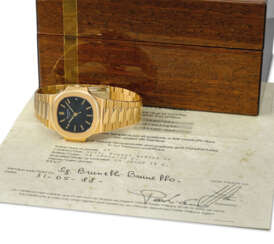 Patek Philippe A fine and extremely rare 18K gold automatic ...