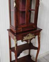 Restored antique display case with beautiful bronze elements Restored antique display case with beautiful bronze elements