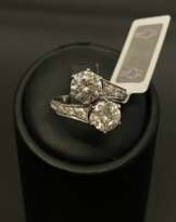 Platinum ring with diamonds and synthetic moissanites Platinum ring with diamonds and synthetic moissanites