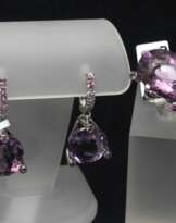 Gold jewelry set with amethysts and pink sapphires Gold jewelry set with amethysts and pink sapphires
