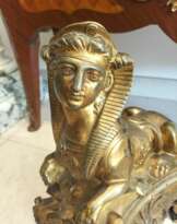 Pair of 19th Century Gilt Bronze Fire Dogs in the Ancient Egyptian Style Pair of 19th Century Gilt Bronze Fire Dogs in the Ancient Egyptian Style