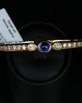 Bracelet en or avec diamants et saphirs Bracelet en or avec diamants et saphirs