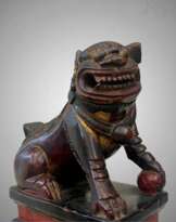 19th Century Pair of Chinese Guardian Lions in Red and Gold Lacquer 19th Century Pair of Chinese Guardian Lions in Red and Gold Lacquer