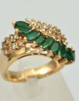 Gold ring with emeralds and diamonds