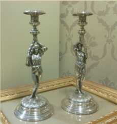  Candlesticks in the form of male and female figures 