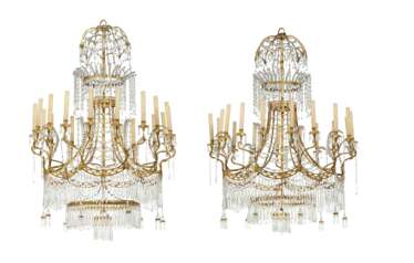 A PAIR OF NORTH EUROPEAN GILT-METAL AND CUT-GLASS EIGHTEEN-LIGHT CHANDELIERS