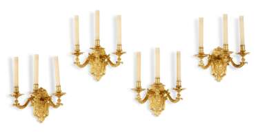 A SET OF FOUR LOUIS XIV STYLE THREE-BRANCH WALL-LIGHTS AFTER THE MODEL BY ANDRE CHARLES BOULLE