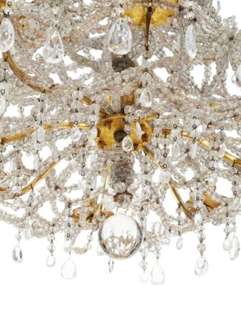 A LOUIS XIV STYLE GILT-METAL AND BEADED CUT-GLASS AND ROCK CRYSTAL EIGHT-LIGHT CHANDELIER - photo 3