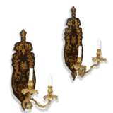 A PAIR OF ITALIAN ORMOLU AND BLACK AND GILT-JAPANNED TWO-BRANCH WALL-LIGHTS - photo 1