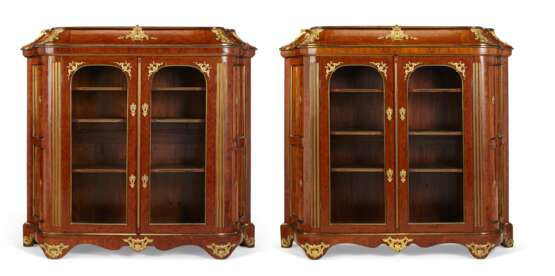 A PAIR OF REGENCE BRASS-INLAID AND ORMOLU-MOUNTED KINGWOOD, TULIPWOOD AND PARQUETRY BIBLIOTHEQUES - photo 1