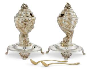 A PAIR OF FRENCH PARCEL-GILT SILVER FIGURAL MUSTARD POTS AND LINERS