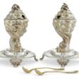 A PAIR OF FRENCH PARCEL-GILT SILVER FIGURAL MUSTARD POTS AND LINERS - Auktionspreise