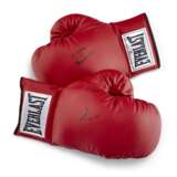 A PAIR OF BOXING GLOVES AUTOGRAPHED BY MUHAMMAD ALI - photo 1