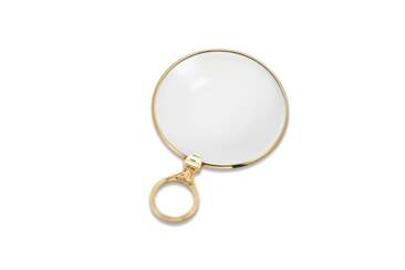 A GOLD MAGNIFYING GLASS