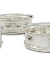 A SET OF FOUR GEORGE III SILVER WINE COASTERS