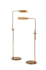 A PAIR OF BRASS ADJUSTABLE FLOOR LAMPS WITH TENT-FORM BRASS SHADES