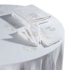 A GROUP OF PORTHAULT LINEN AND CREAM AND GREEN PINWHEEL EMBROIDERED TABLE LINENS