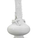 A CHINESE WHITE-GLAZED BOTTLE VASE WITH A COILED DRAGON - photo 2