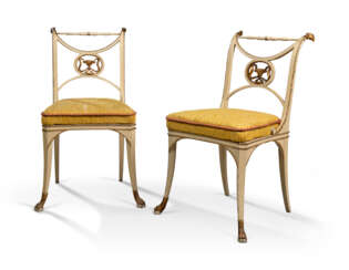 A PAIR OF NORTH ITALIAN EMPIRE WHITE-PAINTED AND PARCEL-GILT SIDE CHAIRS 