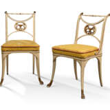 A PAIR OF NORTH ITALIAN EMPIRE WHITE-PAINTED AND PARCEL-GILT SIDE CHAIRS - фото 1