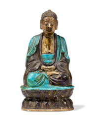 A CHINESE POTTERY FAHUA SEATED FIGURE OF SHAKYAMUNI