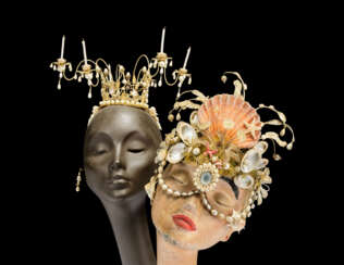 A PAIR OF OLIVER MESSEL HEADDRESSES MOUNTED ON MANNEQUIN HEADS