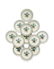 TWELVE ENGLISH PORCELAIN DINNER-PLATES DESIGNED FOR THE PRINCE OF WALES