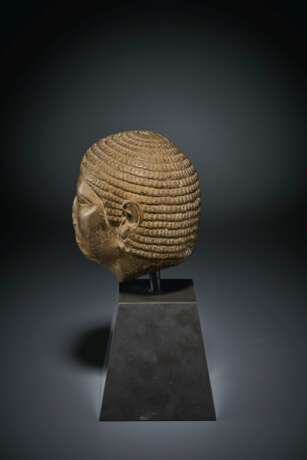 AN EGYPTIAN INDURATED LIMESTONE HEAD OF A MAN - photo 3