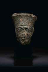 AN EGYPTIAN GRANODIORITE HEAD OF AMUN
