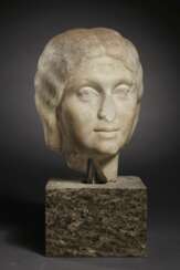 A ROMAN MARBLE PORTRAIT HEAD OF A WOMAN, POSSIBLY JULIA SOEM...