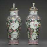 A PAIR OF CHINESE 'SOLDIER' VASES AND COVERS - photo 1
