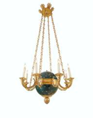 AN EMPIRE ORMOLU AND BLUED AND PARCEL-GILT EIGHT-LIGHT CHAND...