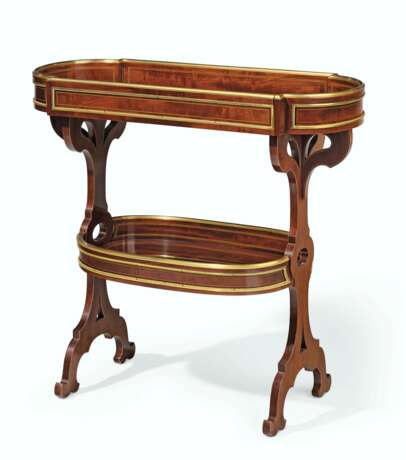 Riesener, Jean-Henri. A FRENCH ORMOLU-MOUNTED MAHOGANY AND LINE-INLAID TABLE TRICO... - фото 1