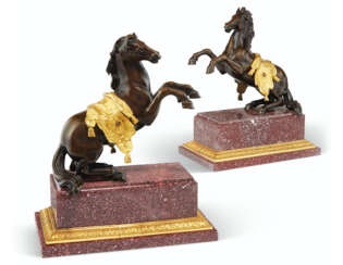 A PAIR OF ORMOLU-MOUNTED BRONZE MODELS OF REARING HORSES
