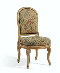A LATE LOUIS XV WHITE-PAINTED AND PARCEL-GILT CHAISE