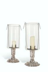 A PAIR OF REGENCE STYLE SILVERED-BRASS PHOTOPHORES