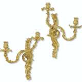 A PAIR OF EARLY LOUIS XV ORMOLU TWIN-BRANCH WALL-LIGHTS - photo 1