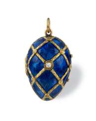 A GOLD AND BLUE GUILLOCHE ENAMEL EGG-FORM LOCKET