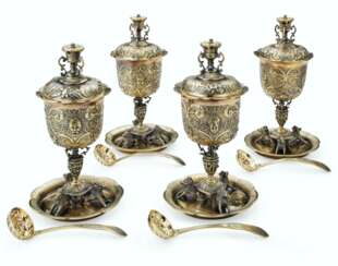 A SET OF FOUR WILLIAM IV SILVER-GILT SUGAR BOWLS, COVERS AND SUGAR SIFTERS