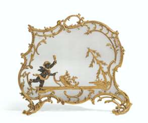 A FRENCH ORMOLU AND PATINATED BRONZE FIRESCREEN
