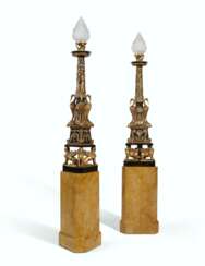TWO PARCEL-GILT AND PATINATED BRONZE TORCHERES, ON STANDS