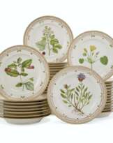 THIRTY-SIX ROYAL COPENHAGEN PORCELAIN ‘FLORA DANICA’ DINNER PLATES