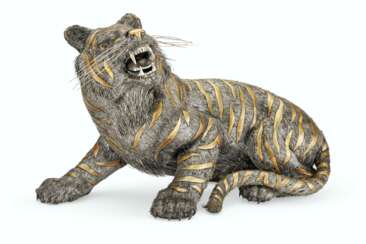 AN ITALIAN PARCEL-GILT SILVER MODEL OF A TIGER