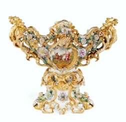 A LARGE FRENCH PORCELAIN RETICULATED FLOWER-ENCRUSTED CENTERPIECE AND STAND