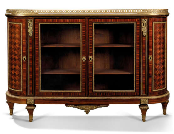 A FRENCH ORMOLU-MOUNTED KINGWOOD, ROSEWOOD AND BOIS SATINE PARQUETRY COMMODE - photo 1