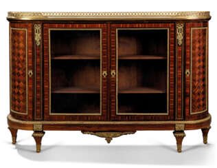 A FRENCH ORMOLU-MOUNTED KINGWOOD, ROSEWOOD AND BOIS SATINE PARQUETRY COMMODE