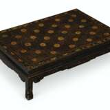 A NEAR PAIR OF CHINESE BLACK AND GILT-LACQUER KANG LOW TABLES - photo 2